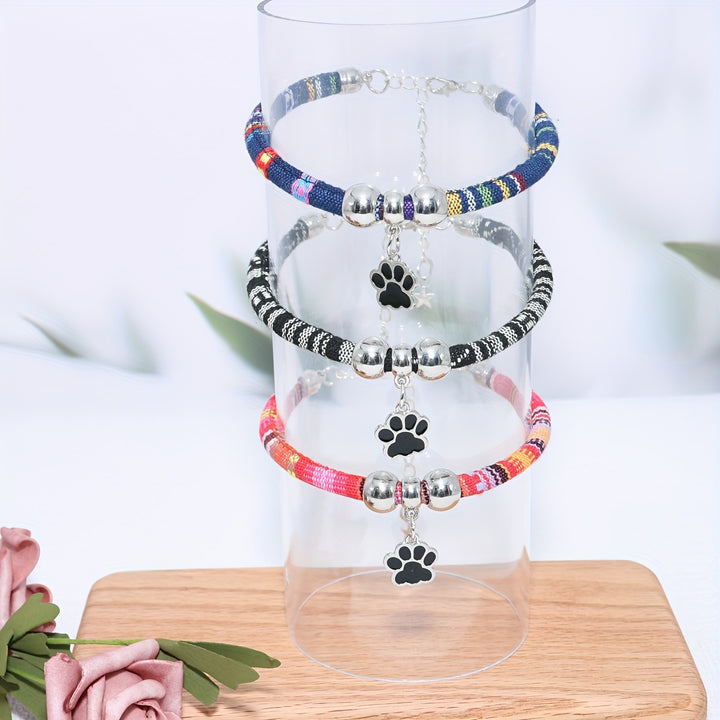 Nylon Pet Necklace with Colorful Paw Print Pendant - Adjustable Cat and Small Dog Collar with Ethnic Design - Durable and Stylish Pet Accessory