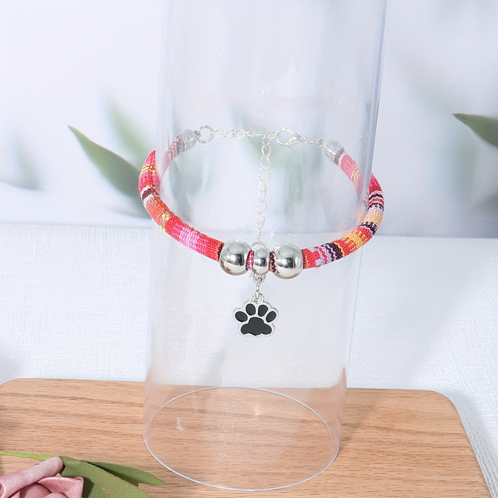 Nylon Pet Necklace with Colorful Paw Print Pendant - Adjustable Cat and Small Dog Collar with Ethnic Design - Durable and Stylish Pet Accessory