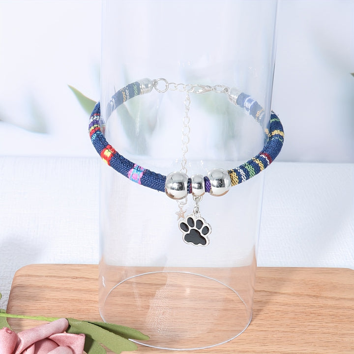 Nylon Pet Necklace with Colorful Paw Print Pendant - Adjustable Cat and Small Dog Collar with Ethnic Design - Durable and Stylish Pet Accessory